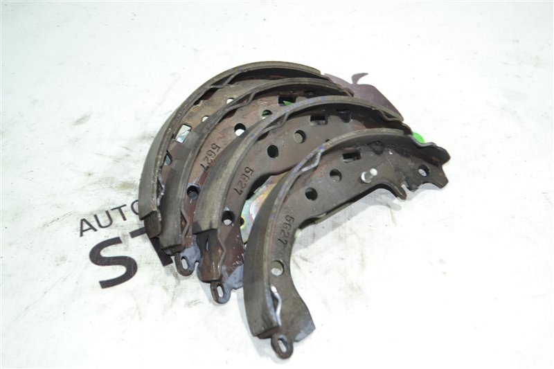 Тормозные колодки Toyota Corolla NZE121 1NZ 2004 заднее (б/у) Тормозные колодки Toyota Corolla NZE121 1NZ 2004 заднее (б/у)