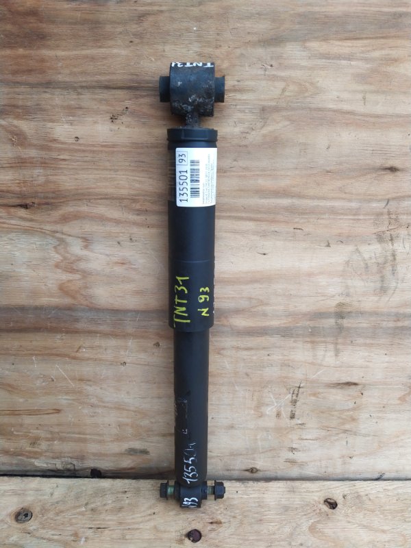 Амортизатор Nissan X-Trail TNT31 QR25 2008 задний (б/у) Амортизатор Nissan X-Trail TNT31 QR25 2008 задний (б/у)