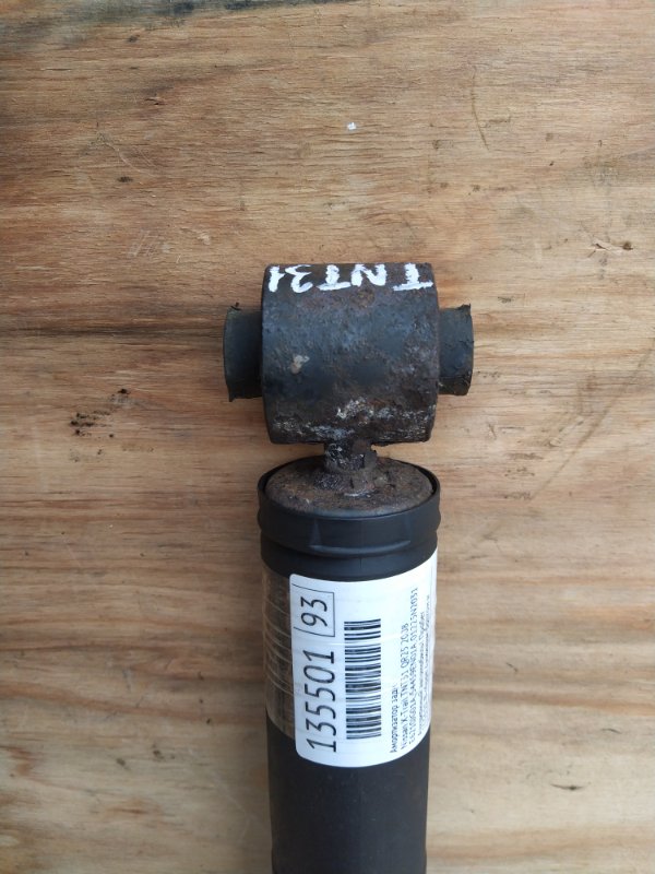 Амортизатор Nissan X-Trail TNT31 QR25 2008 задний (б/у) Амортизатор Nissan X-Trail TNT31 QR25 2008 задний (б/у)