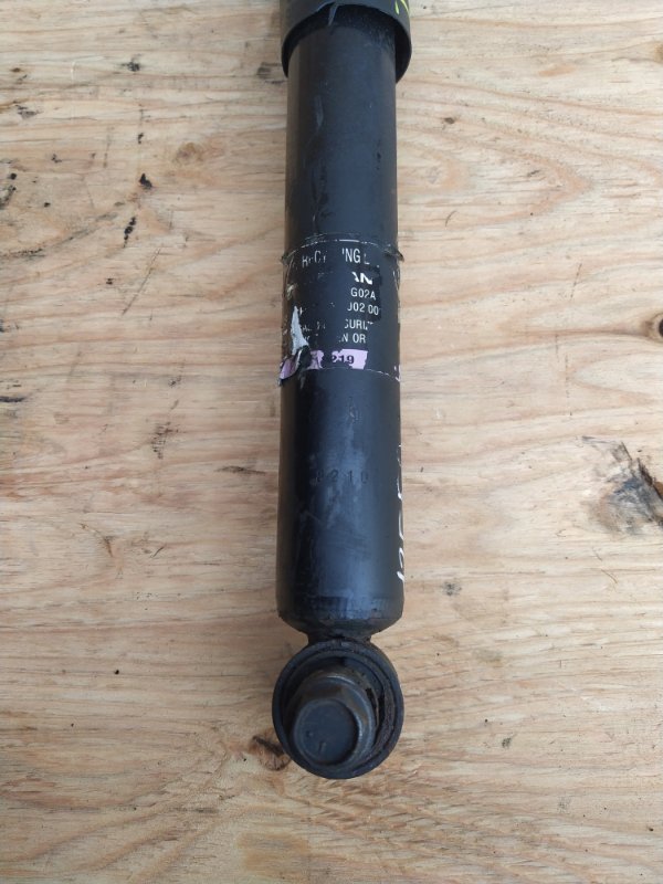 Амортизатор Nissan X-Trail TNT31 QR25 2008 задний (б/у) Амортизатор Nissan X-Trail TNT31 QR25 2008 задний (б/у)