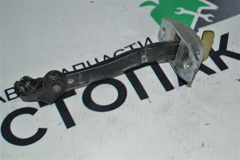 Ограничитель двери Toyota Corolla Runx NZE121 1NZ 2005 задний (б/у)