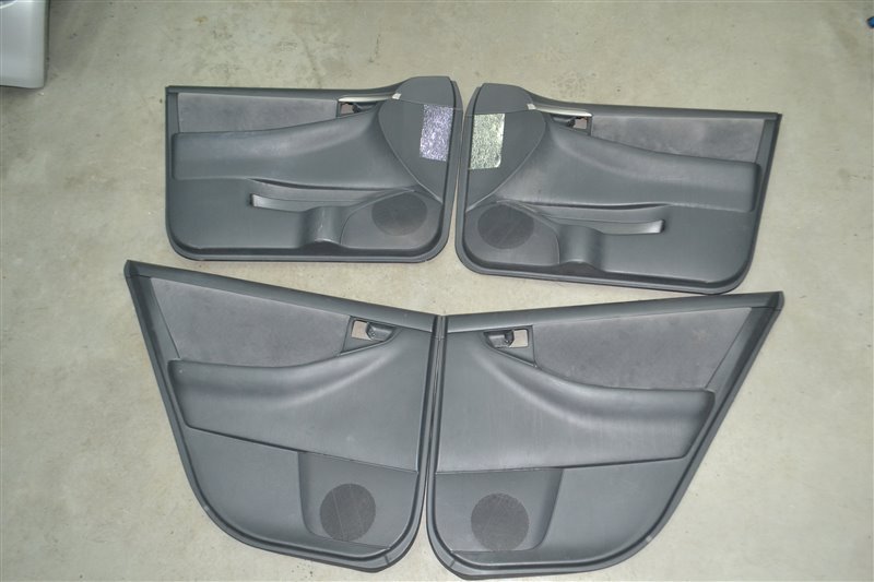 Обшивка дверей (Комплект) Toyota Corolla Runx NZE121 1NZ 2005 (б/у)