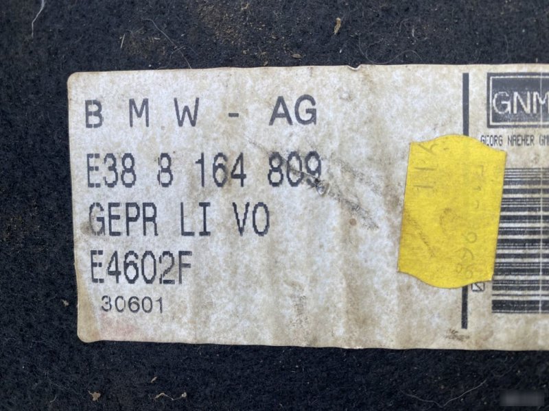 Обшивка багажника левая 7 E38