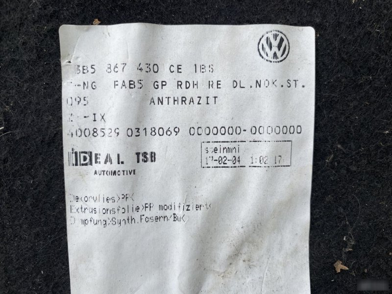 Обшивка багажника левая Passat B5