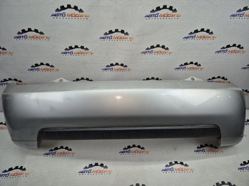 Бампер Toyota Ist NCP60-0141247 2NZ-FE 2004 задний