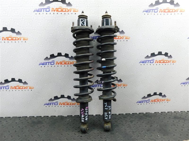 Стойка Toyota Ist NCP65-0020494 1NZ-FE 2003 задняя правая