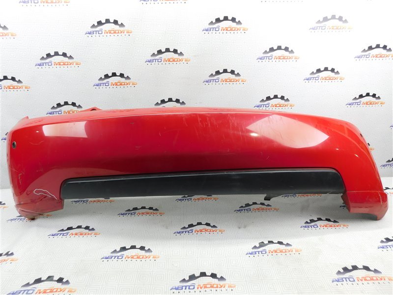 Бампер Toyota Ist NCP65-0020494 1NZ-FE 2003 задний