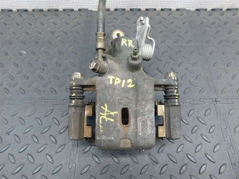 Суппорт NISSAN PRIMERA TP12 задний правый (б/у)