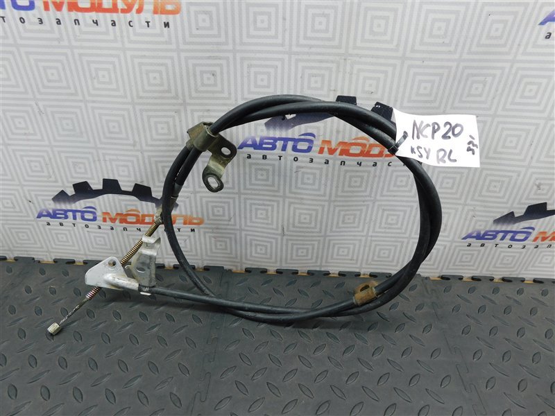 Тросик ручника TOYOTA FUNCARGO NCP20-0223300 2NZ-FE 2002 задний левый (б/у)