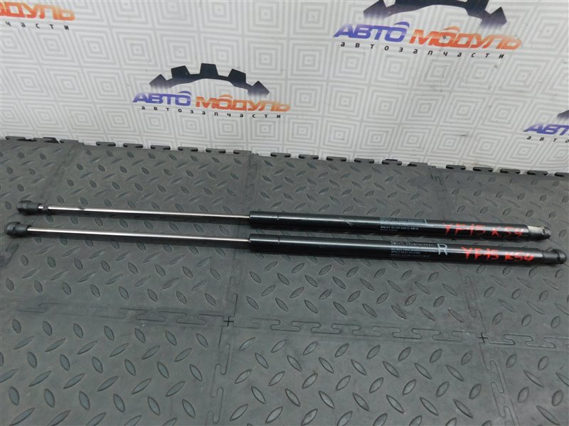 Амортизатор двери багажника NISSAN JUKE YF15-068657 HR15-DE 2012 задний (б/у)