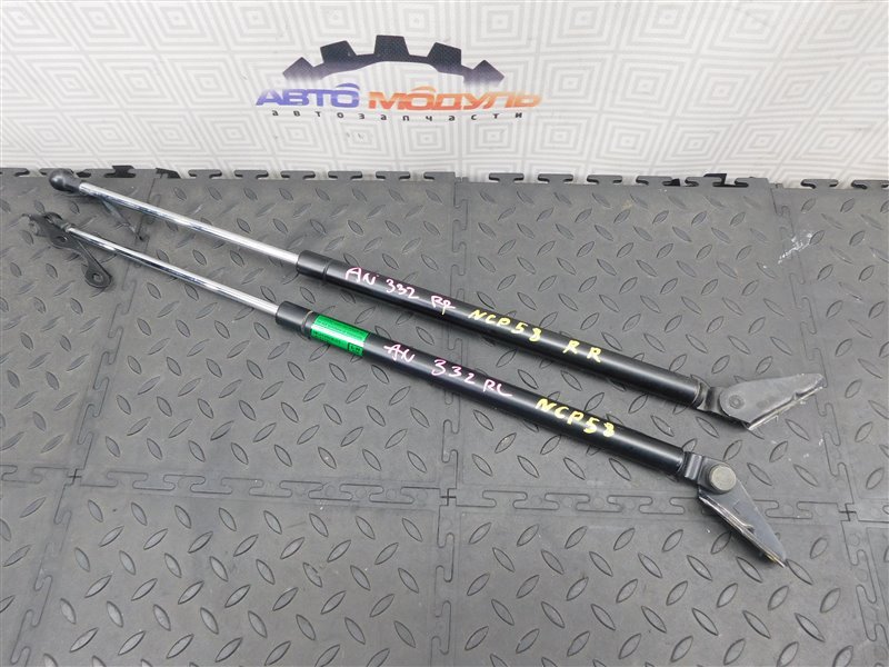 Амортизатор двери багажника TOYOTA IST NCP65-0020494 1NZ-FE 2003 задний (б/у)