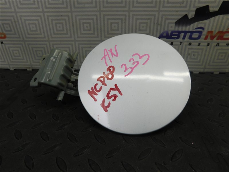 Лючок бензобака TOYOTA IST NCP60-0141247 2NZ-FE 2004 (б/у)