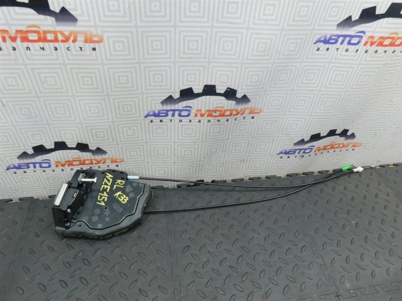 Замок двери TOYOTA AURIS NZE151-1052312 1NZ-FE 2008 задний левый (б/у)