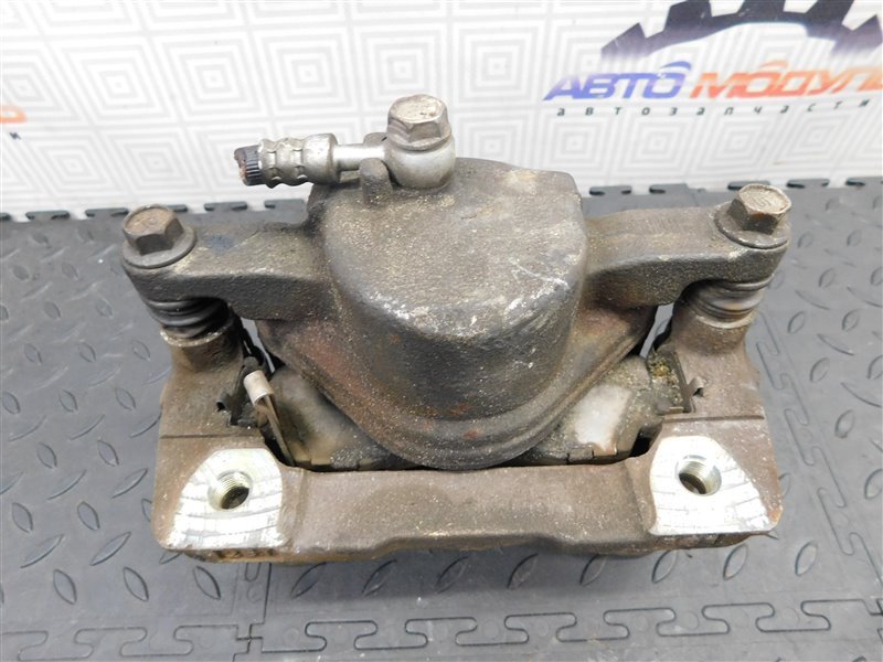 Суппорт HONDA ODYSSEY RA3 передний левый (б/у) Суппорт HONDA ODYSSEY RA3 передний левый (б/у)