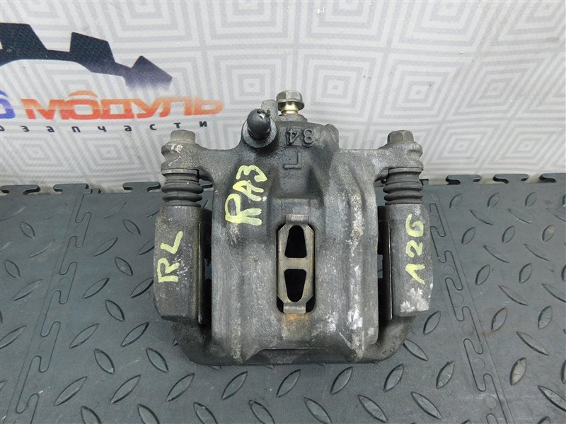 Суппорт HONDA ODYSSEY RA3 задний левый (б/у) Суппорт HONDA ODYSSEY RA3 задний левый (б/у)