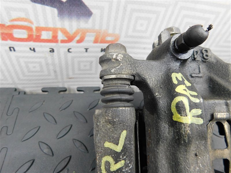 Суппорт HONDA ODYSSEY RA3 задний левый (б/у) Суппорт HONDA ODYSSEY RA3 задний левый (б/у)