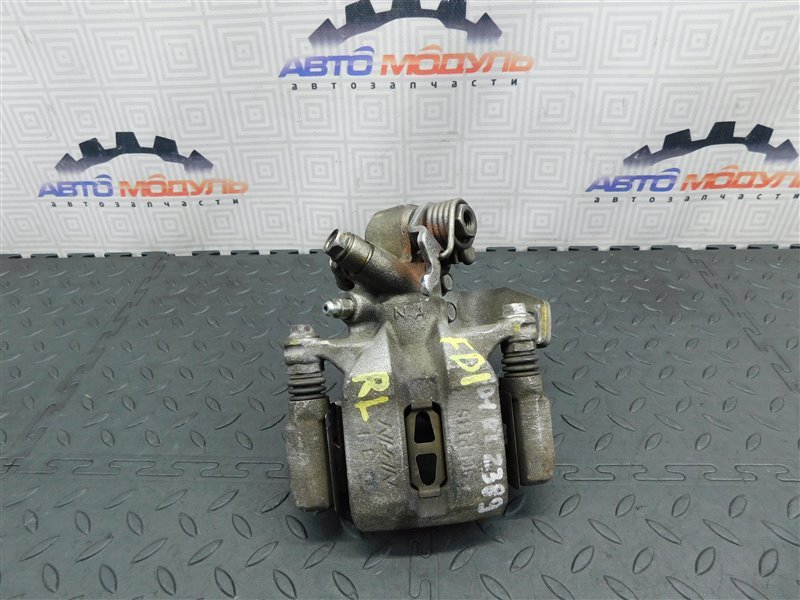 Суппорт HONDA CIVIC FD1 R18A задний левый (б/у) Суппорт HONDA CIVIC FD1 R18A задний левый (б/у)