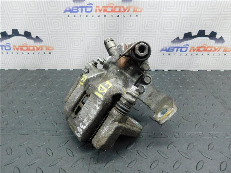 Суппорт HONDA CIVIC FD1 R18A задний левый (б/у) Суппорт HONDA CIVIC FD1 R18A задний левый (б/у)