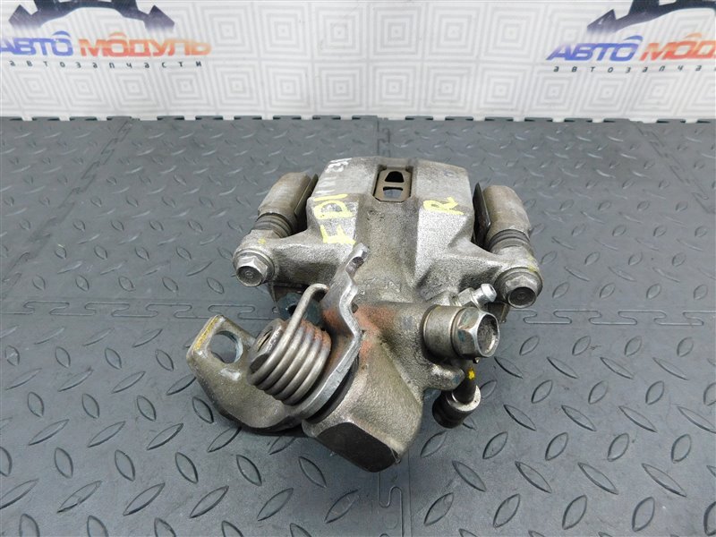 Суппорт HONDA CIVIC FD1 R18A задний левый (б/у) Суппорт HONDA CIVIC FD1 R18A задний левый (б/у)