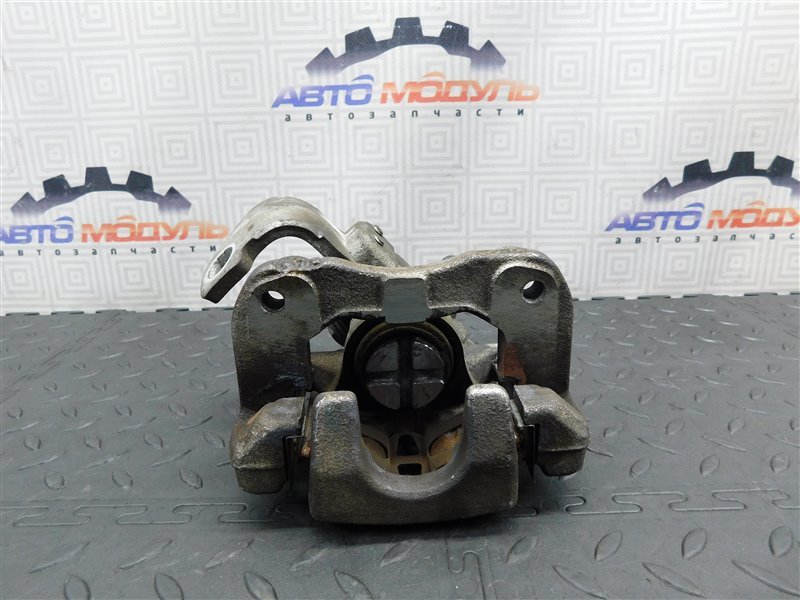 Суппорт HONDA CIVIC FD1 R18A задний левый (б/у) Суппорт HONDA CIVIC FD1 R18A задний левый (б/у)