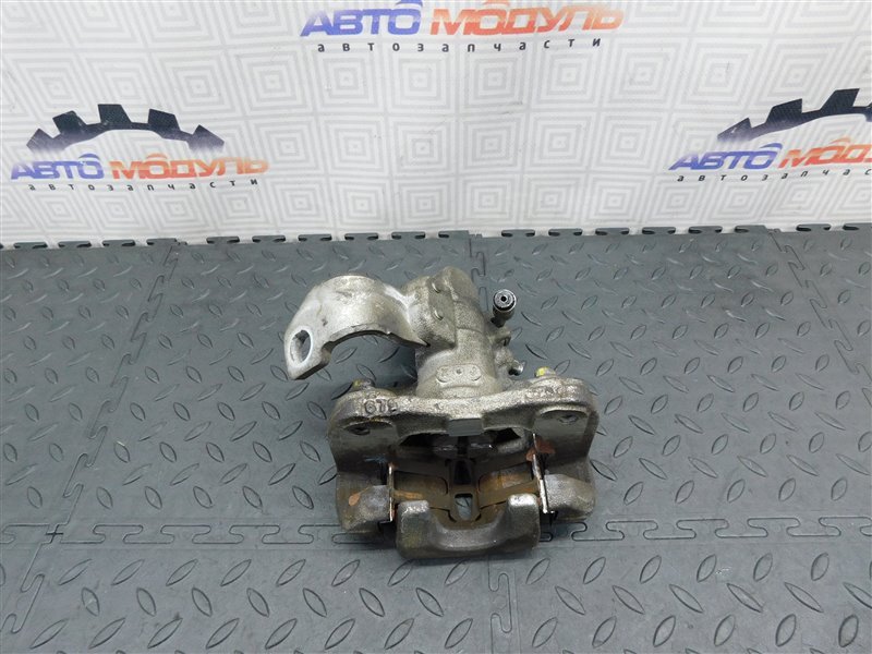 Суппорт HONDA CIVIC FD1 R18A задний левый (б/у) Суппорт HONDA CIVIC FD1 R18A задний левый (б/у)