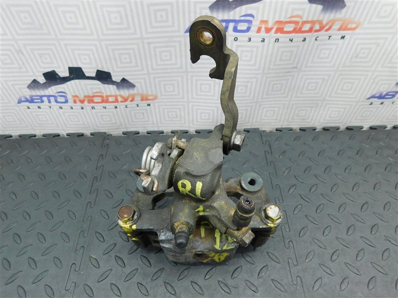 Суппорт NISSAN PRIMERA TP12 задний левый (б/у) Суппорт NISSAN PRIMERA TP12 задний левый (б/у)