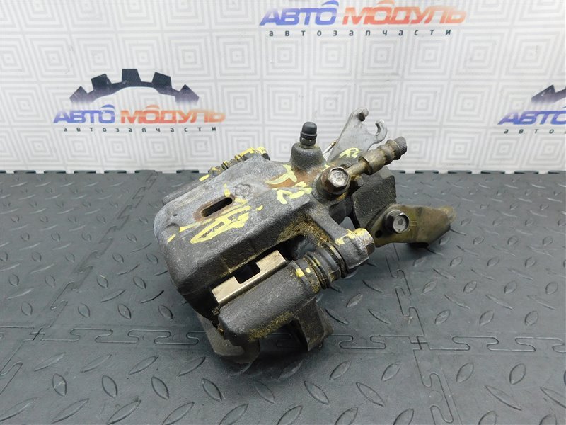 Суппорт NISSAN PRIMERA TP12 задний левый (б/у) Суппорт NISSAN PRIMERA TP12 задний левый (б/у)