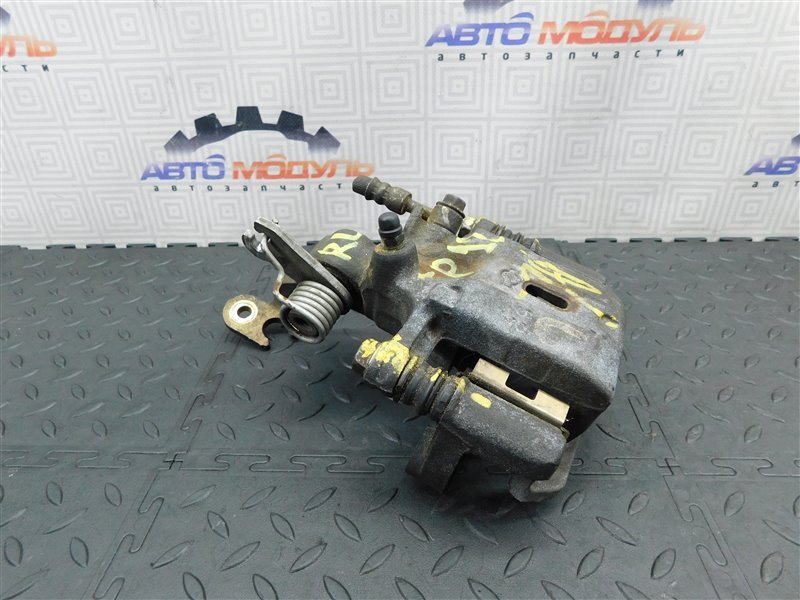 Суппорт NISSAN PRIMERA TP12 задний левый (б/у) Суппорт NISSAN PRIMERA TP12 задний левый (б/у)