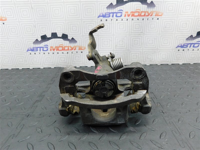 Суппорт NISSAN PRIMERA TP12 задний левый (б/у) Суппорт NISSAN PRIMERA TP12 задний левый (б/у)