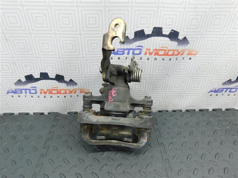 Суппорт NISSAN PRIMERA TP12 задний левый (б/у) Суппорт NISSAN PRIMERA TP12 задний левый (б/у)