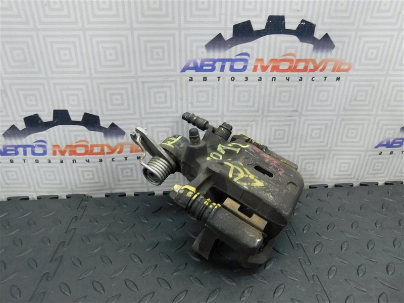 Суппорт NISSAN PRIMERA TP12 задний левый (б/у) Суппорт NISSAN PRIMERA TP12 задний левый (б/у)