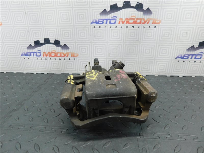 Суппорт NISSAN PRIMERA TP12 задний левый (б/у) Суппорт NISSAN PRIMERA TP12 задний левый (б/у)