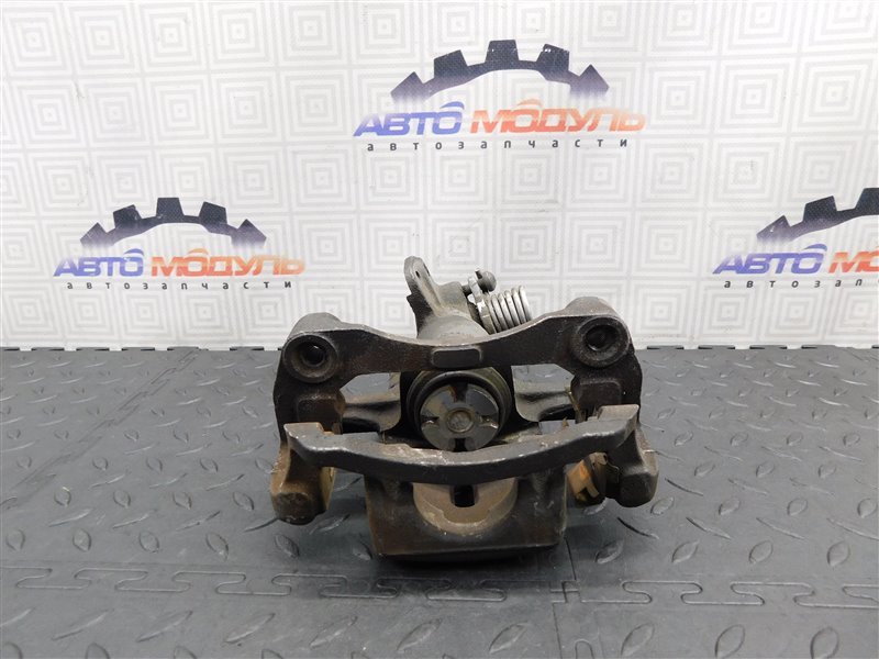 Суппорт NISSAN PRIMERA TP12 задний левый (б/у) Суппорт NISSAN PRIMERA TP12 задний левый (б/у)