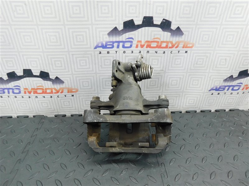 Суппорт NISSAN PRIMERA TP12 задний левый (б/у) Суппорт NISSAN PRIMERA TP12 задний левый (б/у)