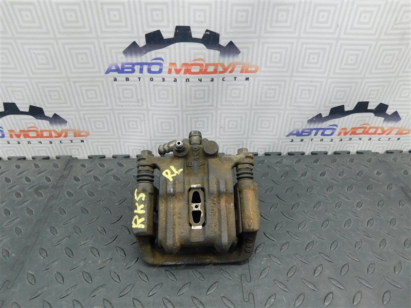 Суппорт HONDA STEPWGN RK5 задний левый (б/у)