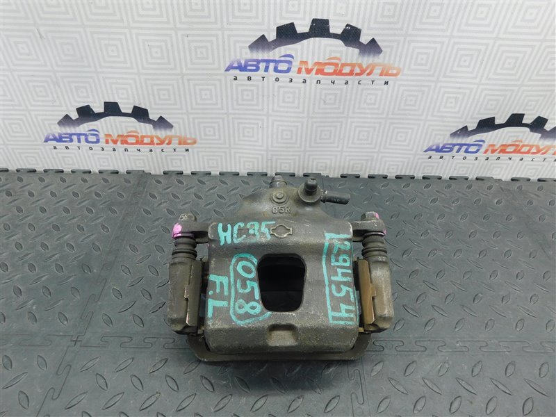 Суппорт NISSAN LAUREL HC35 передний левый (б/у)