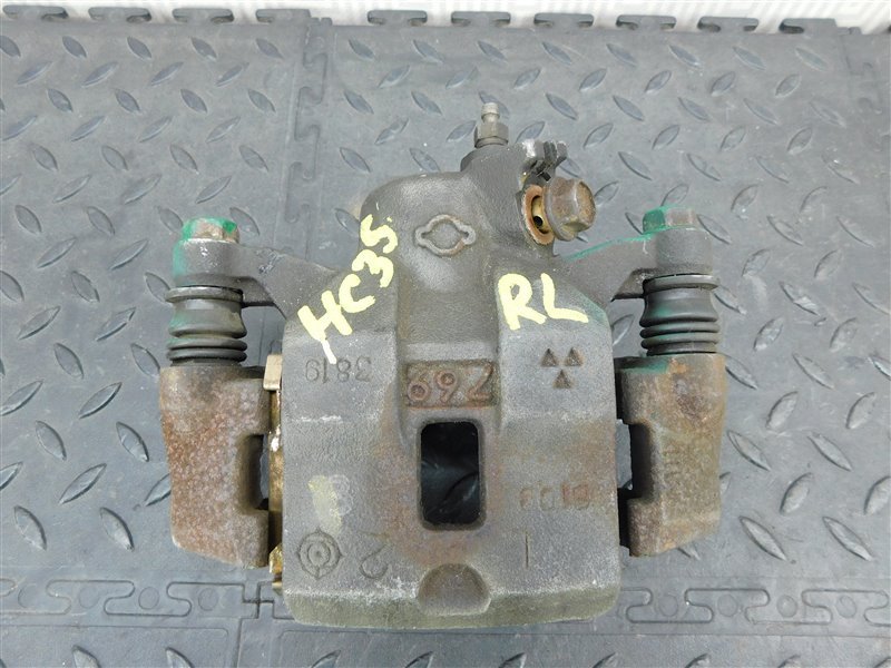 Суппорт NISSAN LAUREL HC35 задний левый (б/у)