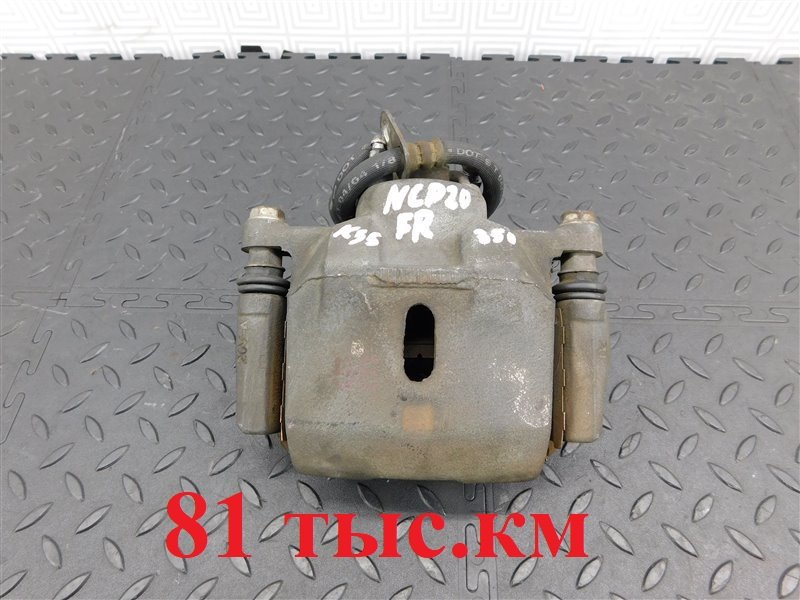 Суппорт TOYOTA FUNCARGO NCP20-0350489 2NZ-FE 2004 передний правый (б/у)