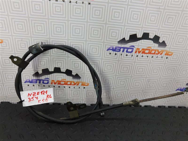 Тросик ручника TOYOTA COROLLA FIELDER NZE121-0137282 1NZ-FE 2002 задний левый (б/у)