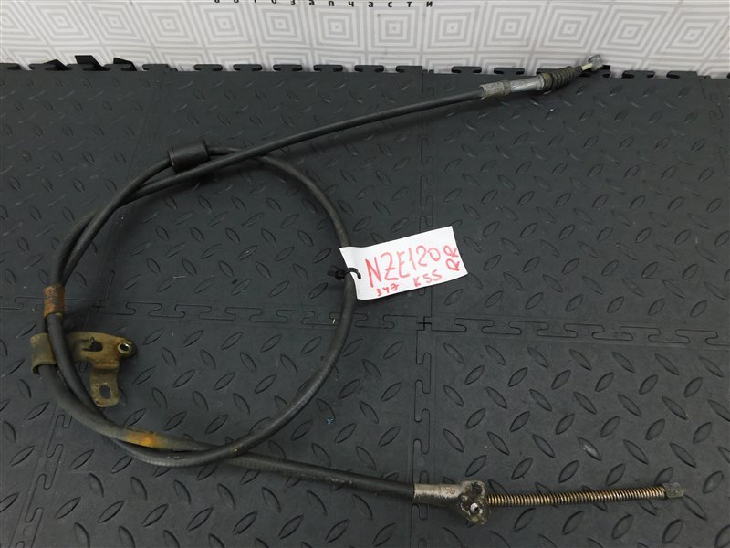 Тросик ручника TOYOTA COROLLA NZE120-3013144 2NZ-FE 2002 задний правый (б/у)