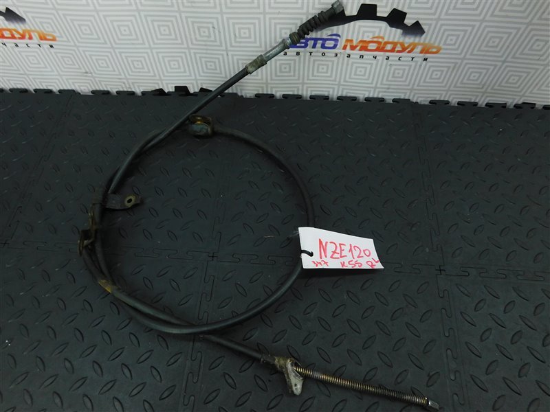 Тросик ручника TOYOTA COROLLA NZE120-3013144 2NZ-FE 2002 задний левый (б/у)