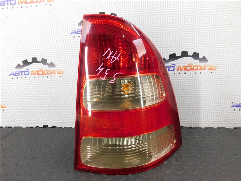 Стоп TOYOTA COROLLA FIELDER NZE121-0113998 1NZ-FE 2002 задний правый (б/у)