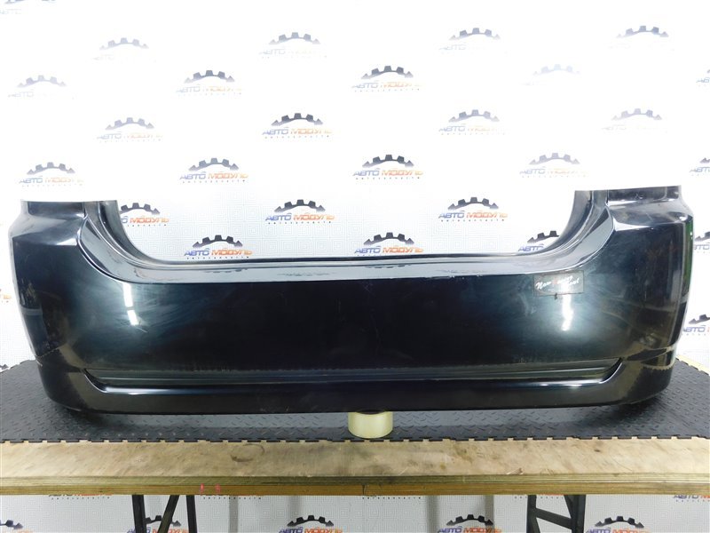 Бампер TOYOTA ALLEX NZE121-0342255 1NZ-FE 2005 задний (б/у)