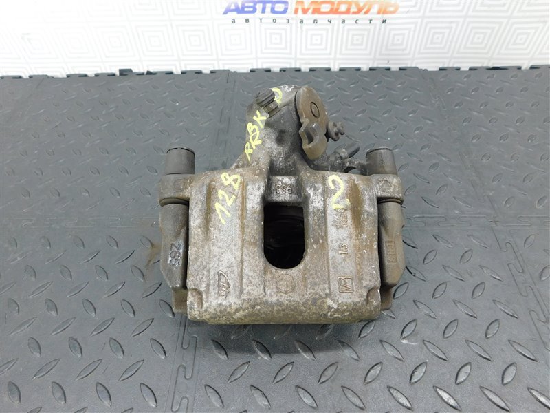 Суппорт MAZDA AXELA BKEP задний правый (б/у)