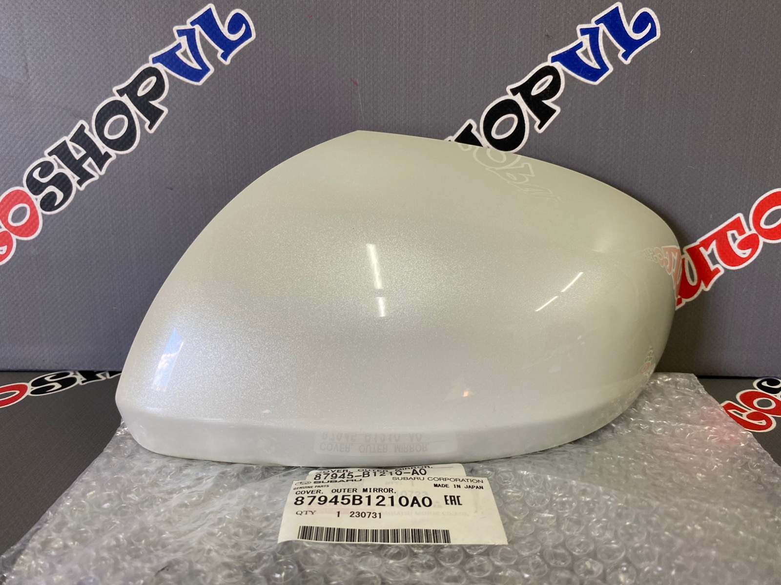 Запчасть накладка на зеркало левая TOYOTA ROOMY M900 87945-B1210-A0 новая Накладка на зеркало левая TOYOTA ROOMY M900 87945-B1210-A0 новая