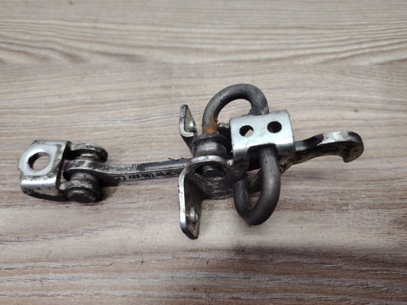 Ограничитель двери задний левый Omega B 2003 25 Z22XE