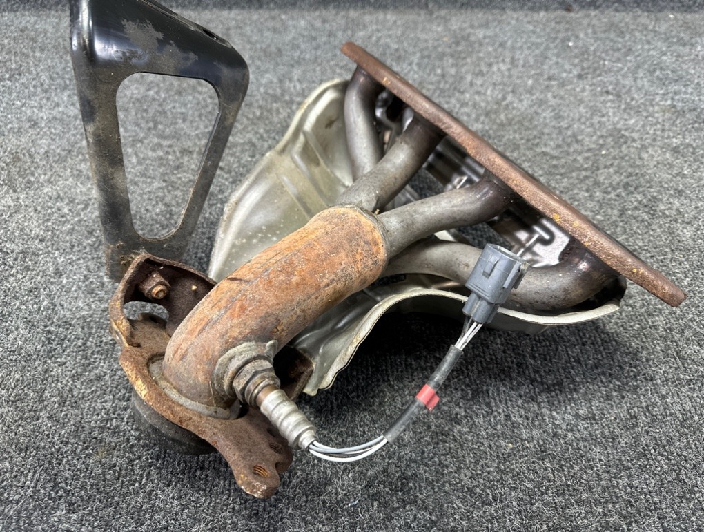 Коллектор выпускной Corolla Spacio NZE121N 1NZ