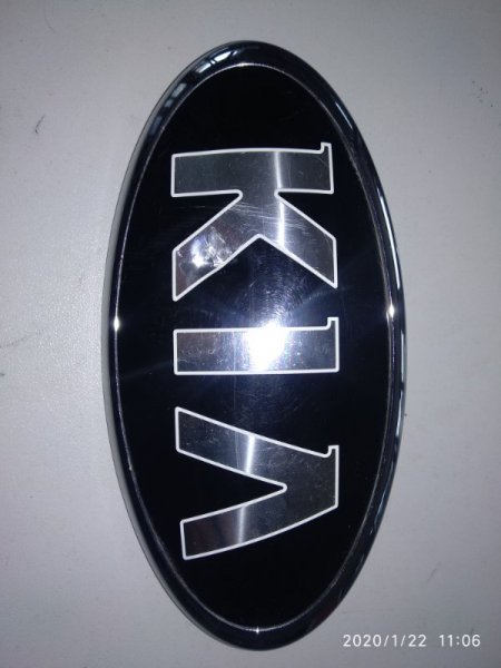 Эмблема Kia (б/у) Эмблема Kia (б/у)