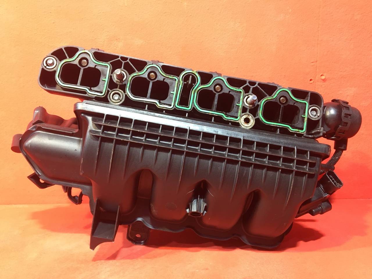 Коллектор впускной Opel Corsa D