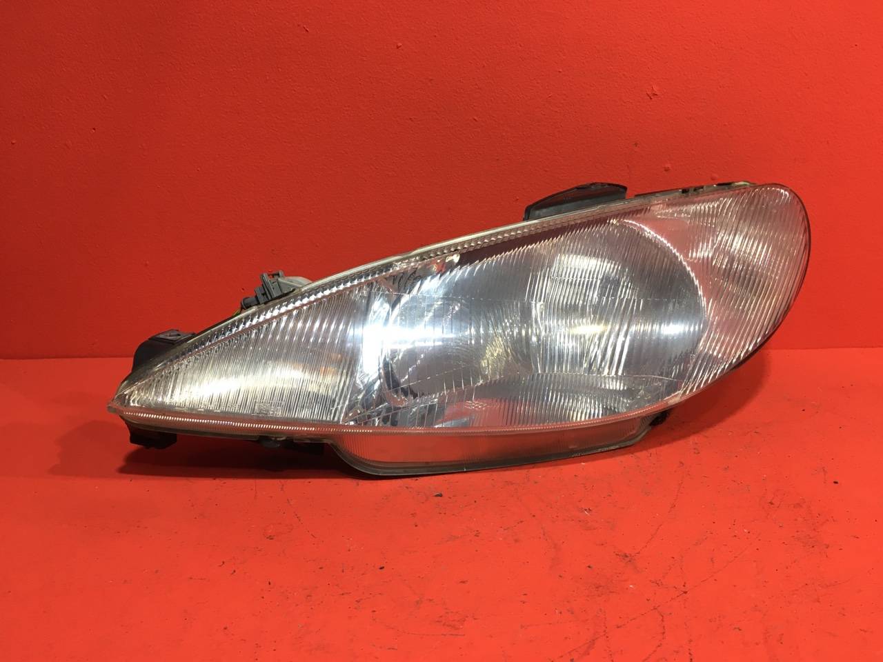 Фара Peugeot 206